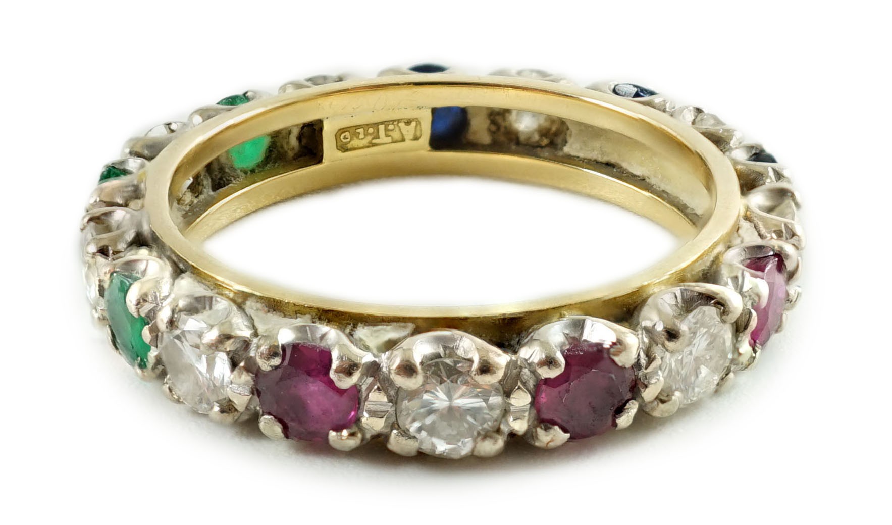 A modern 18ct gold, emerald, sapphire, ruby and diamond set full eternity ring